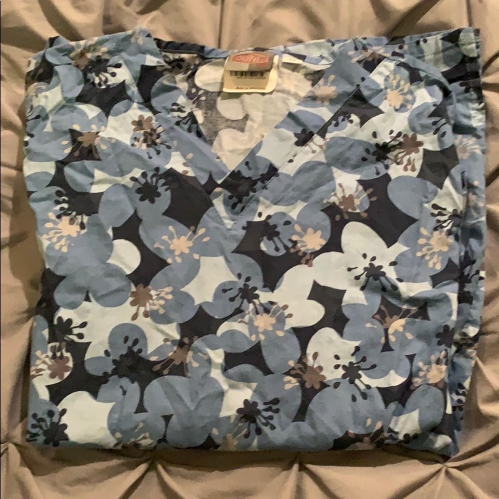 Blue floral print scrub top